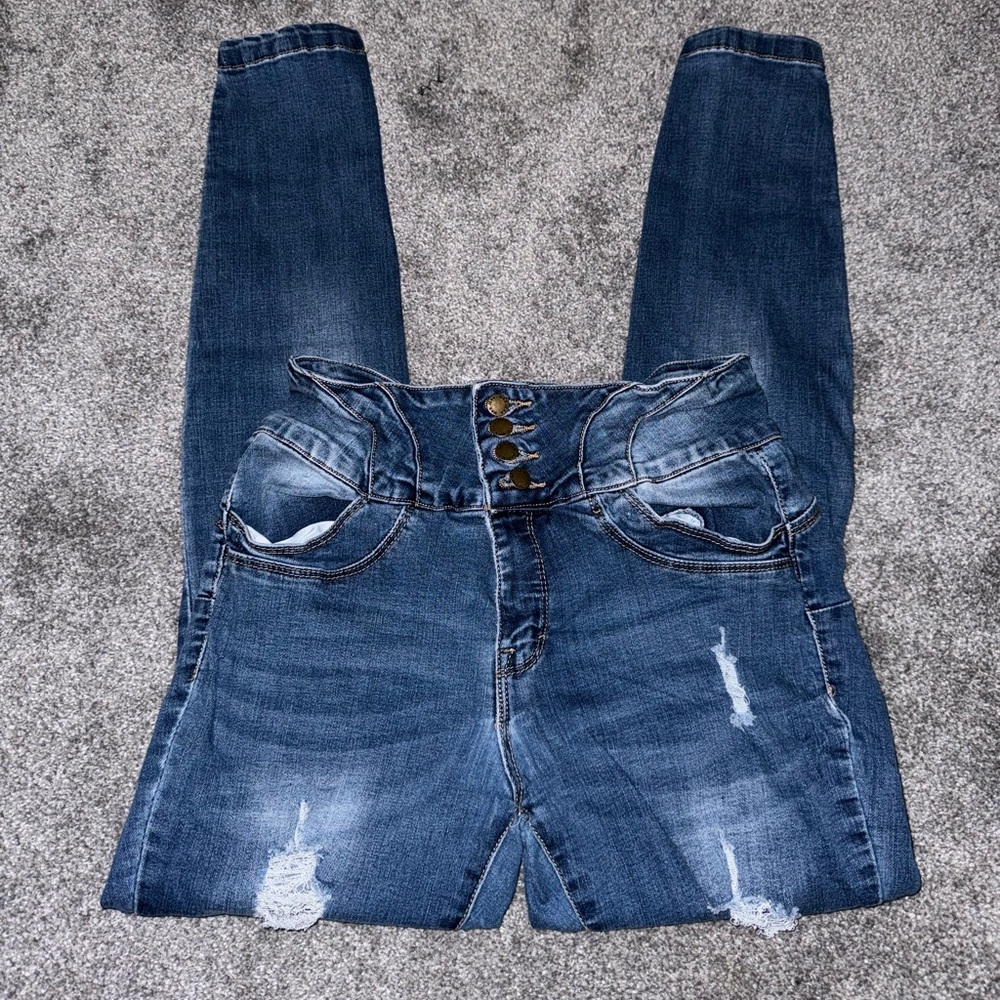 Medium washed ripped skinny jeans
